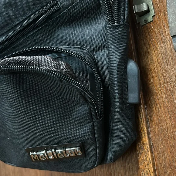 MeijieLuo Sling Shoulder Crossbody Chest Bag- usb charging travel pack Black